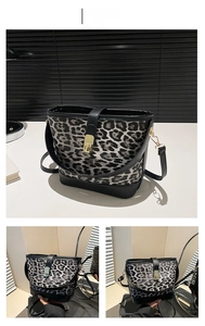 Detailed views of leopard print bucket bag featuring a secure golden twist lock closure