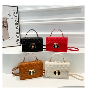 Quilted crossbody bags in black, red, brown, and cream with golden metal twist locks