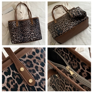 Detail of leopard print tote bag featuring gold rivets and matching small pouch