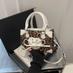 Chic leopard print small square handbag with white heart patch and bow detail