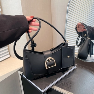 Minimalist black crescent moon underarm bag with gold buckle and small coin pouch