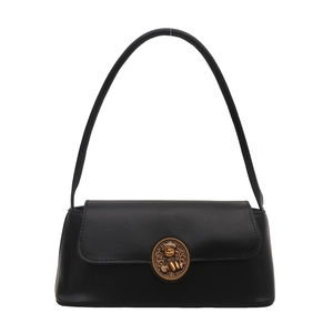 Retro black leather underarm bag with a vintage golden bear buckle on a white background