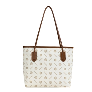 Retro print tote bag in cream white PU leather with brown handles and floral pattern