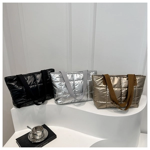 Quilted down nylon tote bags in black, silver and bronze with wide webbing handles