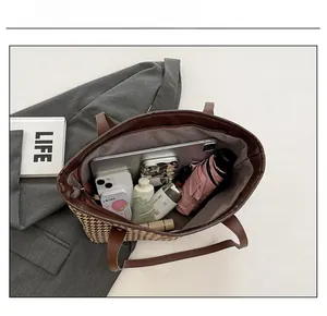 Top view of houndstooth tote bag interior showing capacity for tablet and cosmetics