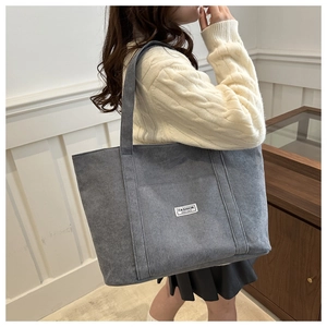 Grey-blue corduroy tote bag for women showing large capacity and fashion handle