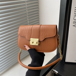 Chic brown crocodile pattern leather shoulder bag with gold clasp and chain strap