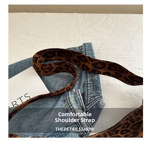 Close-up of plush leopard print shoulder strap on a retro casual large tote bag