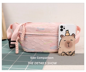 Size comparison of a quilted pink crossbody bag with colorful wavy stitching and a phone