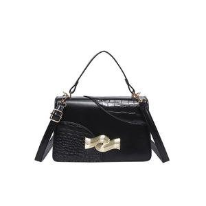 Vintage black crossbody bag with crocodile pattern and golden wavy buckle detail