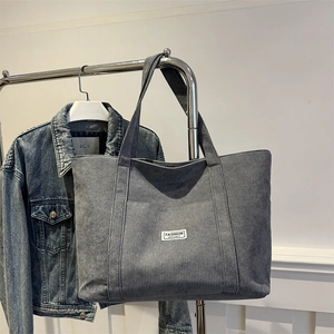 Minimalist grey corduroy tote bag with large capacity and Fashion Instinct label