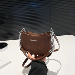 Deep brown smooth leather underarm bag with silver chain decoration and shoulder strap
