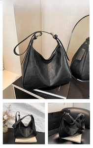 Detail of black Hobo tote bag showing textured PU leather and golden zipper hardware