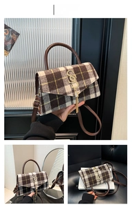 Detail of plaid wool crossbody bag with golden S-buckle and elegant chain tassel