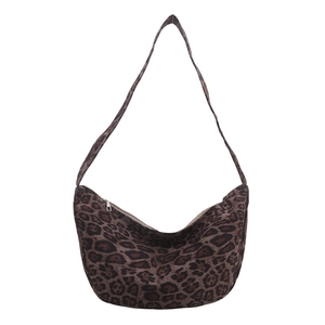 Large leopard print crescent tote bag with wide shoulder strap and zipper closure