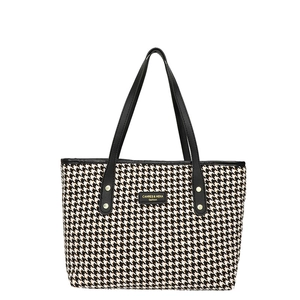 Stylish houndstooth tote bag with black leather handles and gold rivet accents for work