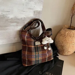 Retro plaid tote bag with cloud charm pendant for women, perfect for college and daily use