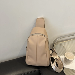 Minimalist beige PU leather crossbody bag with adjustable strap for daily commute wear