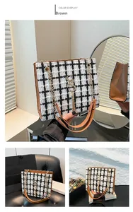 Close-up of brown plaid tweed tote bag with gold chain strap and tassel detail