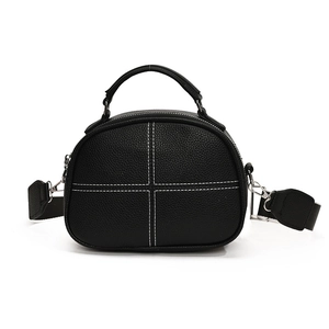 Minimalist black pebble texture crossbody bag with wide strap and white stitching