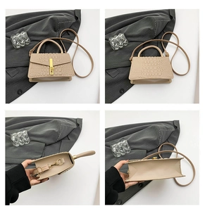 Detailed views of beige crocodile embossed handbag showing golden lock and interior