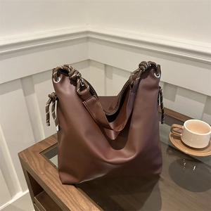 Retro deep brown soft leather tote bag with unique woven rope shoulder straps