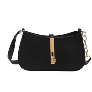 Sac sous le bras minimaliste en cuir noir mat avec fermoir vertical en métal doré