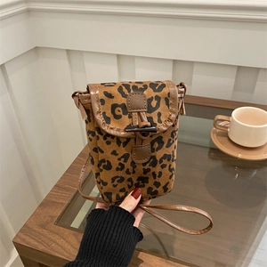 Classic leopard print crossbody phone bag with toggle closure and adjustable brown strap