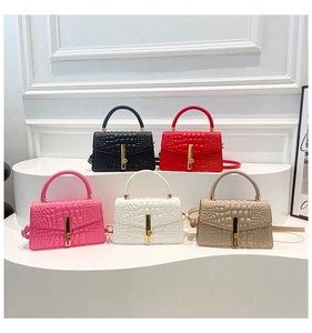 Detailed display of crocodile pattern leather handbags in five elegant colors with gold locks
