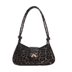Leopard print underarm bag with golden bow buckle and slim shoulder strap
