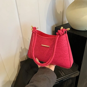 Chic magenta lace underarm bag with gold metal buckle and woven handle for women