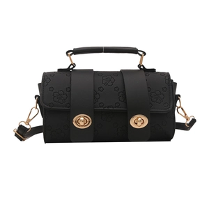 Classic black Boston handbag with floral embossed pattern and gold hardware
