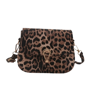 Leopard print saddle bag for women with gold hardware and adjustable shoulder strap