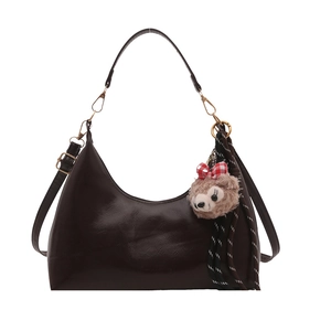 Polished oil-wax leather half-moon shoulder bag in dark brown with bear charm and scarf