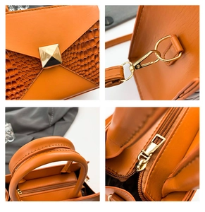 Detailed views of orange tote bag with crocodile texture and golden hardware accents
