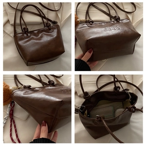 Detail shots of retro brown PU leather tote with SNUR GOOD embossed logo and inner lining