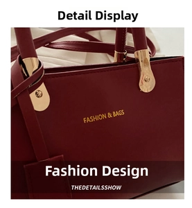 Detail of burgundy leather handbag featuring gold hardware and FASHION & BAGS logo