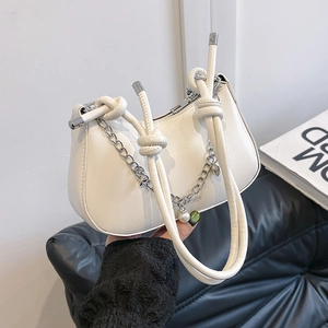 White crescent moon bag with knotted strap and decorative silver chain for women
