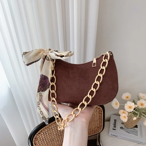 Retro dark brown frosted shoulder bag with bold gold chain and silk scarf detail