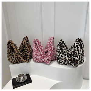 Three plush leopard print tote bags in coffee, pink heart and monochrome faux fur