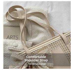 Close-up of beige woven tote bag featuring a delicate lace bow and slim leather strap