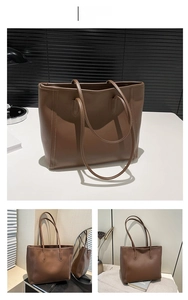 Detail view of coffee brown minimalist leather tote bag showing large capacity and handles