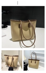 Detail view of khaki PU leather tote bag with brown trim and shoulder straps