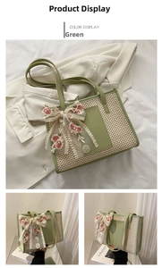Detail of woven straw tote bag with green leather trim and floral lace bow decoration