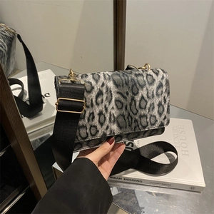 Fashionable leopard print crossbody square bag with wide strap and gold hardware