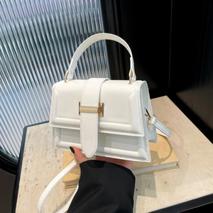 Chic white rectangle crossbody bag with metallic square lock and handle