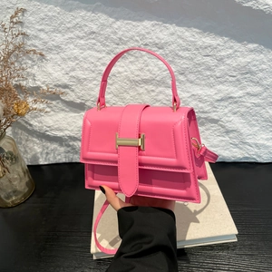 Pink minimalist crossbody square bag with gold H-buckle and top handle for women