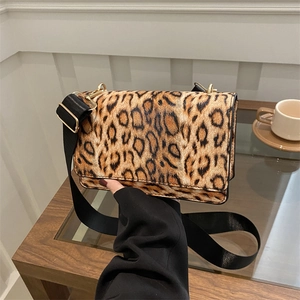 Fashionable leopard print square shoulder bag with adjustable wide strap and gold hardware