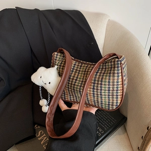 Vintage plaid wool shoulder bag with brown leather trim and white cloud charm accessory