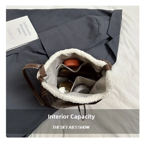 Interior view of patchwork bucket bag showing spacious storage for makeup and phone
